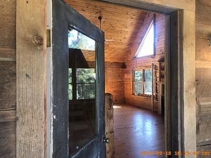 Building Photo - Secluded Log Cabin with a view of horses!