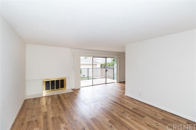 Building Photo - 6716 Woodlake Ave