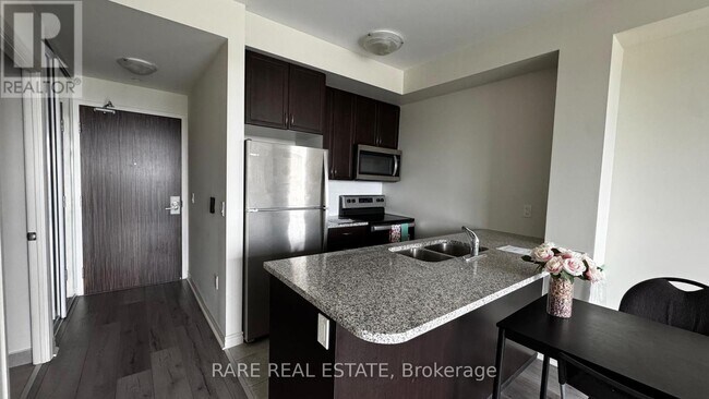 Photo du bâtiment - 349-349 Rathburn Rd W