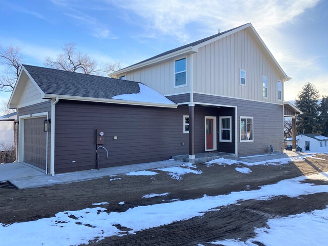 Front and Side of House (landscaping and fence coming soon) - 1130 Swope Ave