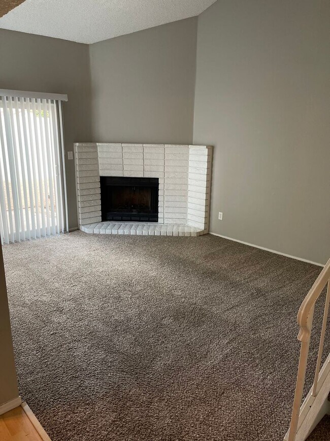 Building Photo - Updated Two Bedroom, 1.5 Bath Condo w/Fire...