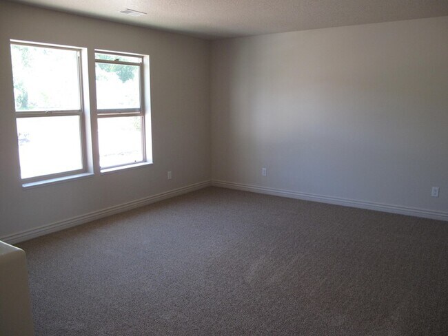 Building Photo - 1429 Wild Rose Way