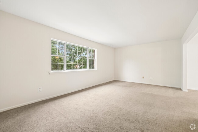 2BR, 1BA w/ Balcony - 1,230SF - Living Room - Carriage Run Apartments & Townhomes