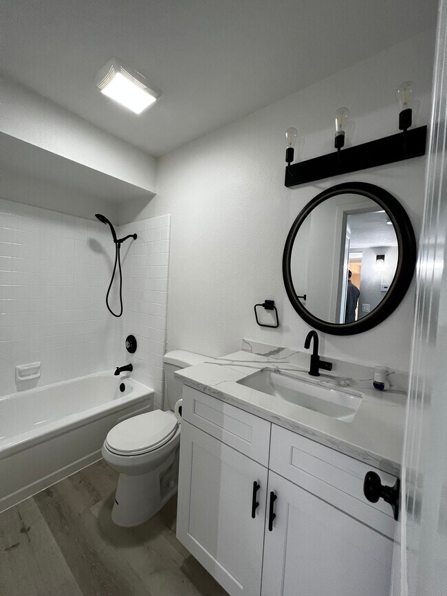 Bathroom is outside the bedroom. - 1020 E Washington Ave