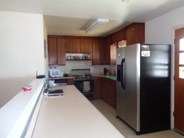 Building Photo - $1995 | 4BR/2BA | Spacious 3 bedroom For R...