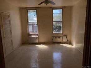Building Photo - 74-51 64th Pl