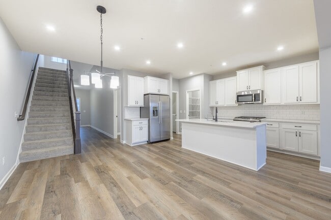 Building Photo - Awesome maple grove 5 bed 4 bath townhome! Pond views, 2 years old!