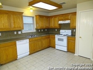 Building Photo - 6046 Mountain Meadow