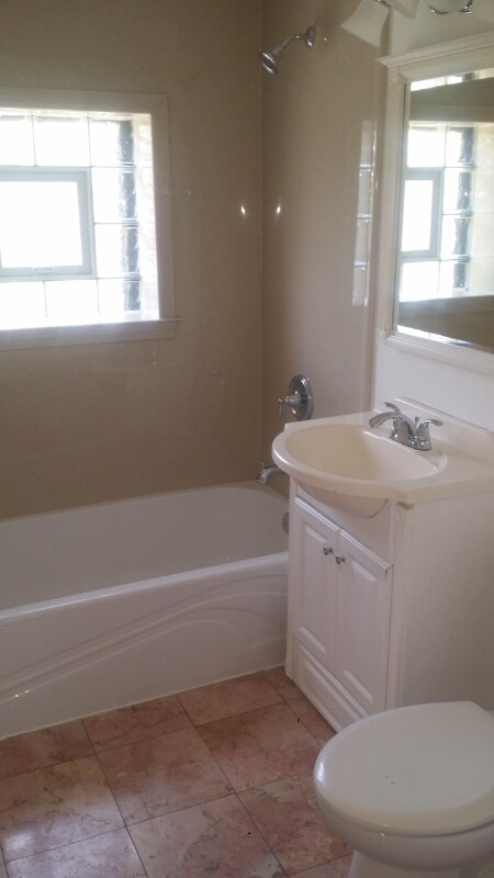 Building Photo - 1301 E 71st Pl