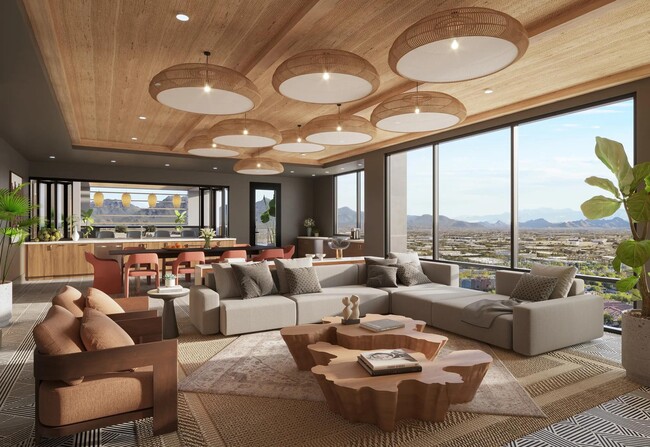 Sky lounge with versatile indoor and outdoor entertainment area, fire pits, lounge seating, and sweeping views. - Modera Scottsdale