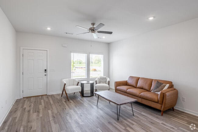 3BR, 2.5BA - 1,528SF - Living Room - Flyway Meadows