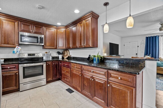 Foto del edificio - Spacious 4-Bedroom Home with Saltwater Pool & Large Fenced Yard