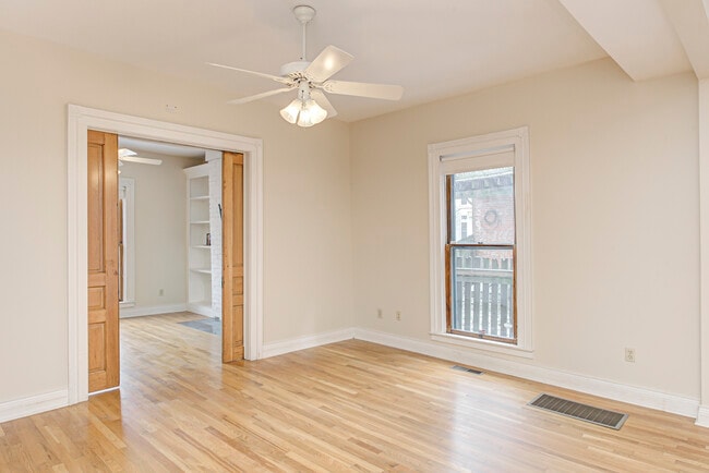 Pocket doors leading to dining room - 237 E Saint Joseph St