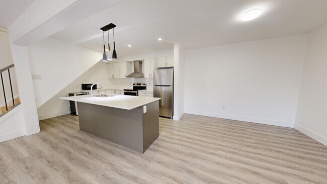 Building Photo - MODERN 3 BEDROOM TOWNHOME ON ANDOVER DRIVE