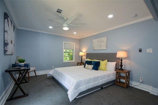 Building Photo - Modern 2BR/2BA Apartment with Private Deck...