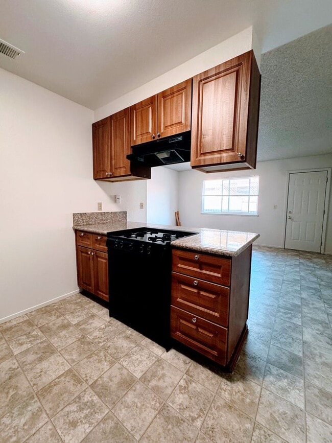 Photo - Charming 2-Bedroom Duplex with Large Fenced Yard & Attached Garage House