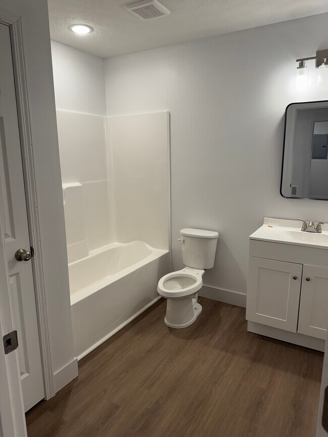 Baño - Sunrise Suites Apartments