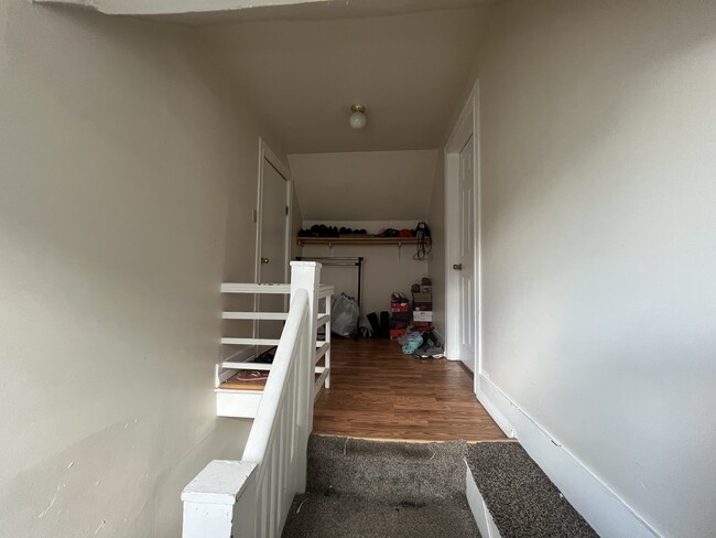 Stairway to upstairs - 74 N Allen St