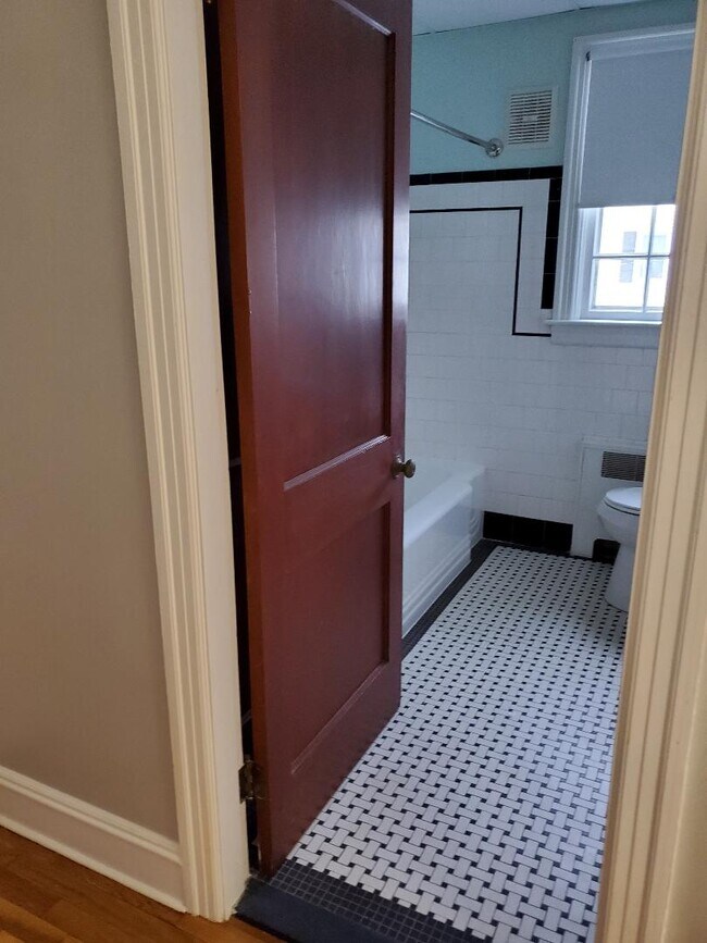 bath flooring - 626 S Main St
