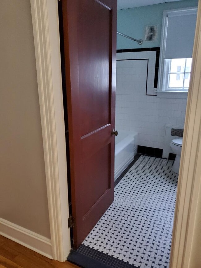 bath flooring - 626 S Main St