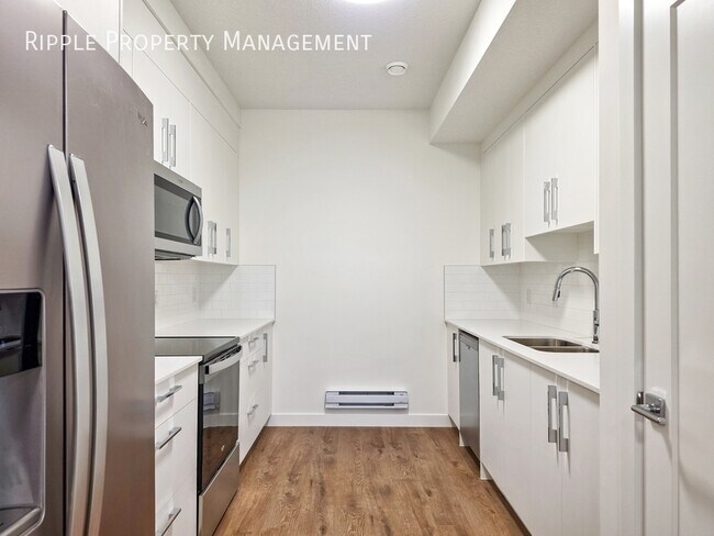 Photo du bâtiment - BRAND NEW 1 BED, 1 BATH BASEMENT SUITE | PRIVATE ENTRY & HIGH-END FINISHES
