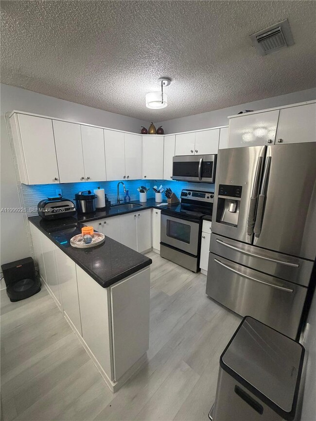 Foto del edificio - 6878 NW 173rd Dr