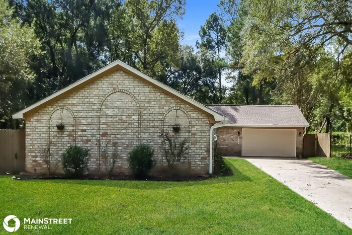 Foto principal - 816 GLEN HOLLOW DR, CONROE, TX 77385