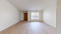 Located at 3602 N Kingston Dr in Peoria, Illinois, this single-floor, 2-bedroom, 2-bathroom home offers a well-designed layout with a clean, bright aesthetic throughout. Light hardwood flooring flows seamlessly across the main living areas and bedrooms, creating a cohesive and inviting atmosphere.

The open kitchen is a functional highlight of the home, featuring warm wood cabinetry, stainless steel appliances including a range, microwave, refrigerator, and dishwasher, as well as a double sink and a peninsula with bar-height seating. An adjacent utility room houses a full-size washer and dryer, adding everyday convenience. The kitchen transitions naturally into the living room, which benefits from large windows that bring in generous natural light.

The primary bedroom is a comfortable retreat, complete with a ceiling fan, mirrored closet doors, and direct access to a dedicated closet. The second bedroom also features hardwood flooring, a ceiling fan, and a large window with blinds. Both bathrooms are well-appointed — one includes a granite-topped vanity with dark cabinetry and a soaking tub, while the other features a clean, all-white walk-in shower stall. A hallway connects the main living spaces to the bedrooms and bathrooms, keeping the layout efficient and organized.