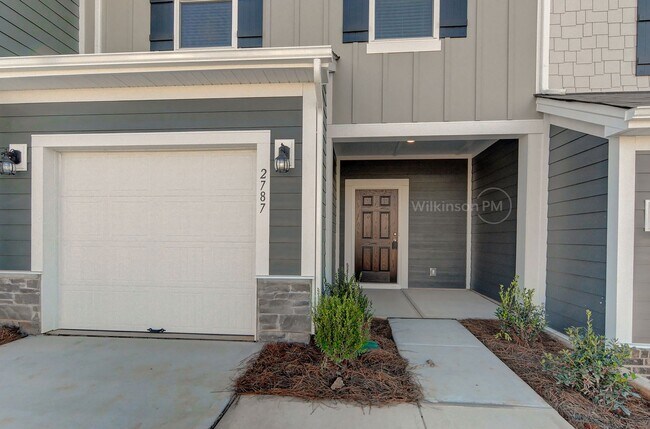Building Photo - Stunning new construction townhome at Pipe...