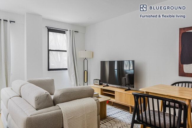 Building Photo - 227-231-231 E 59th St