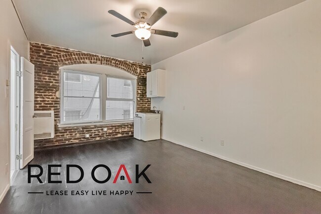 Foto del edificio - Enchanting Studio with Sunlit Rooms, A/C, ...