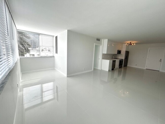 Building Photo - Fully Renovated East-Facing 2BR/2BA + Bonus Room | Ocean Views | In-Unit W/D