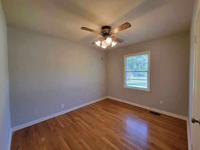 Building Photo - Fabulous 3-Bedroom Home with Gleaming Hard...