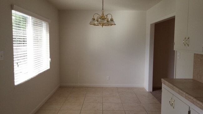 Building Photo - Recently updated home with modern amenitie...