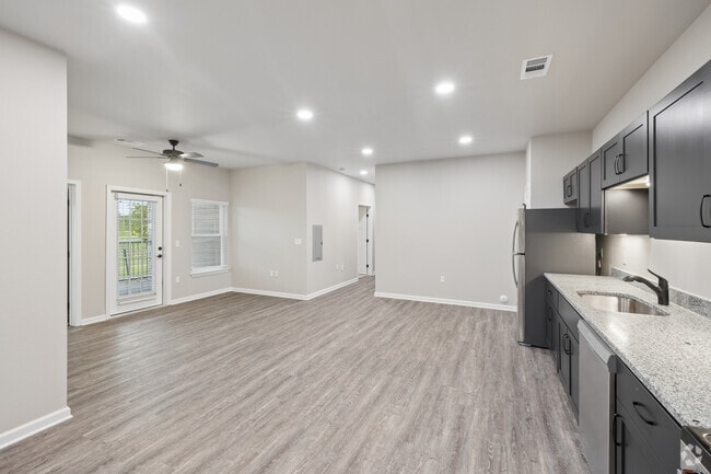 4BR, 2BA - 1,396SF - Kitchen, Living and Dining Area - Bennington Park
