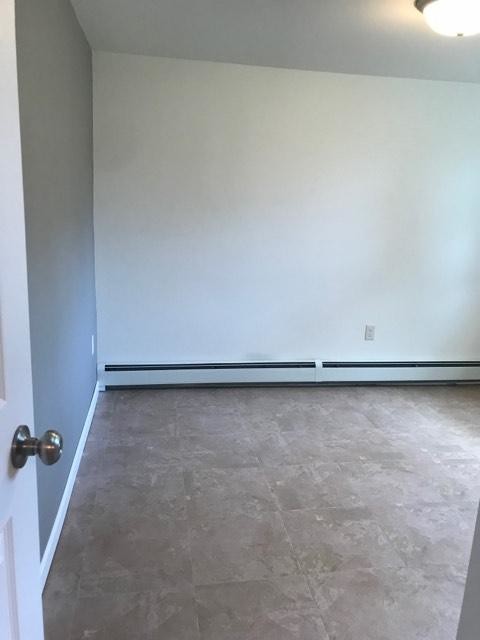 Building Photo - 11 8th Ave NW #1