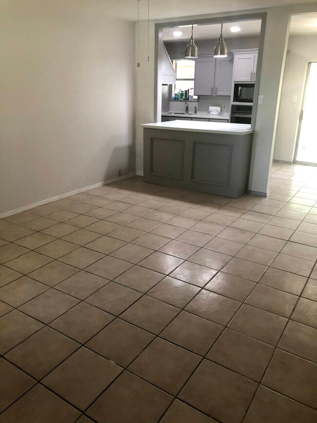 View of kitchen from living room. - 601 E Williamson Ave
