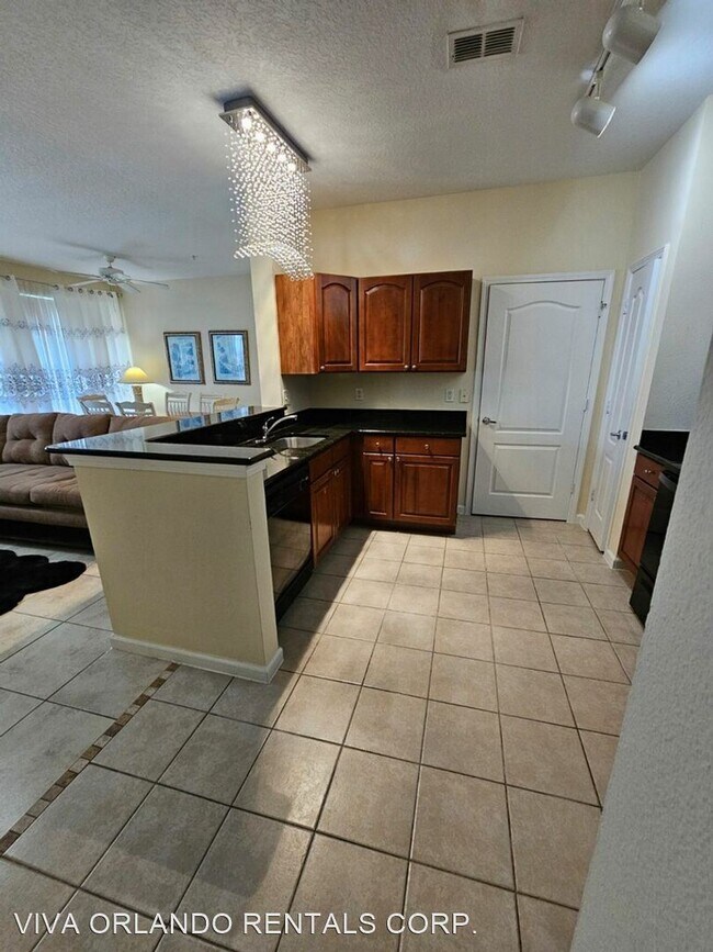 Building Photo - 2 br, 2 bath House - 5253 CANE ISLAND LP #204