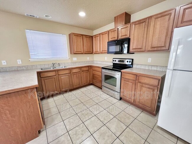 Building Photo - 6523 S Covewood Way