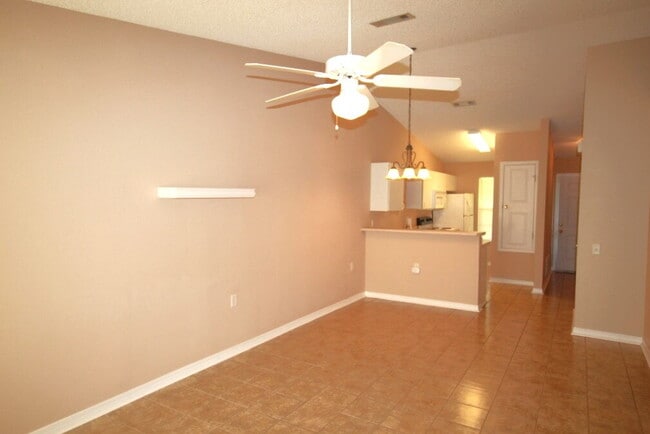 Building Photo - 2BR/1BA with Fenced Yard – Lawn Care Inclu...