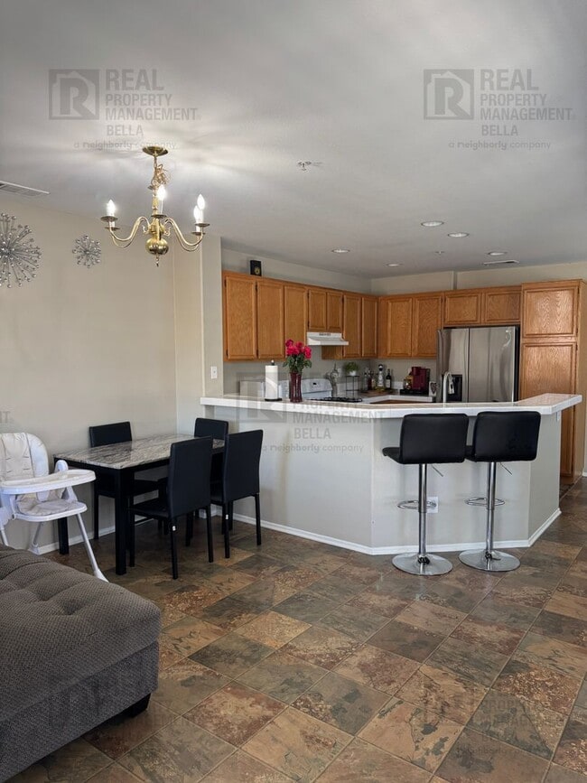 Building Photo - Charming End-Unit Condo with Modern Amenit...