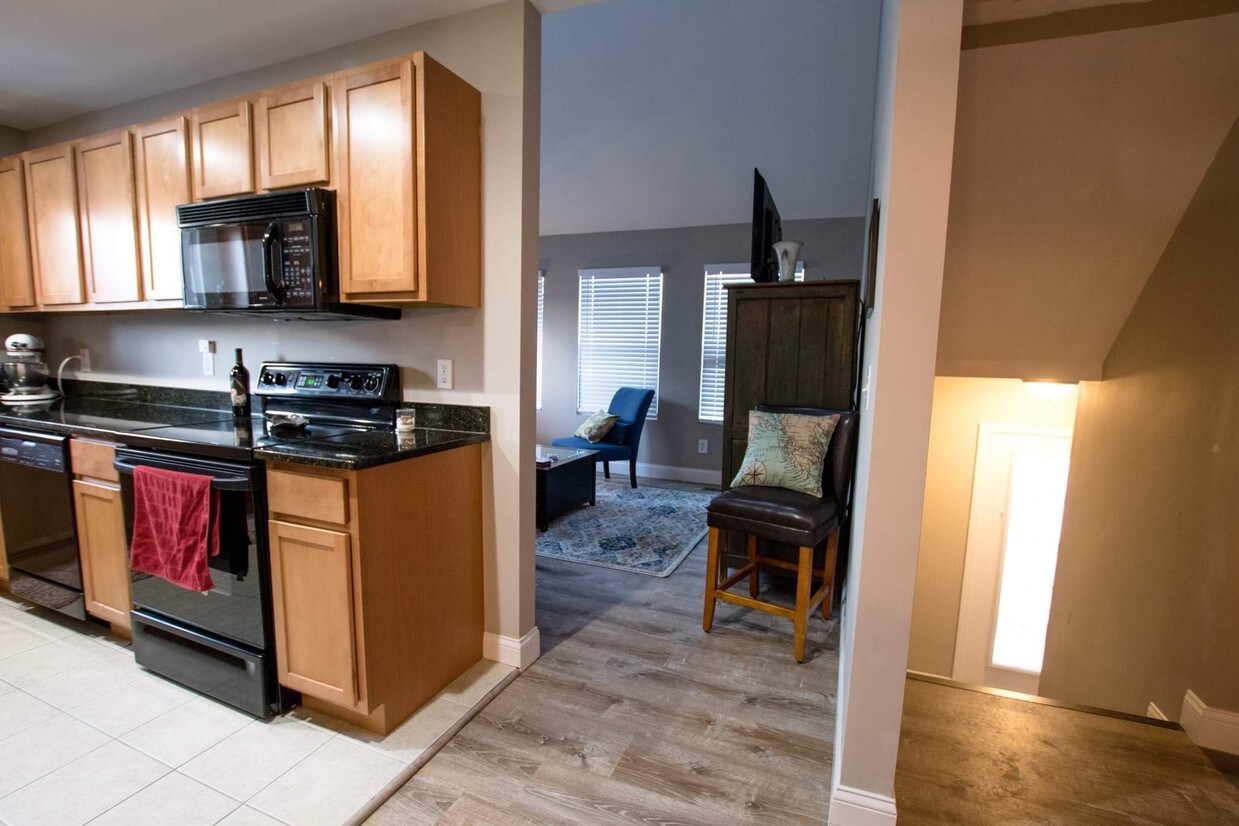 Kitchen to living area - 206 Park Green Dr
