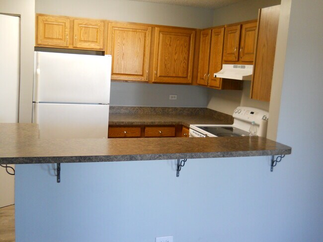 Kitchen with room for stools - 1975 N Hicks Rd