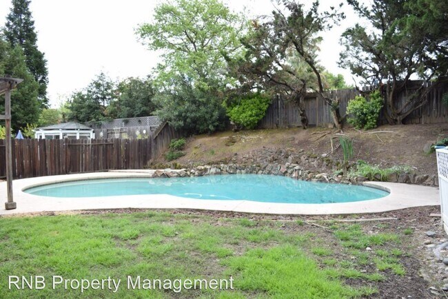 Building Photo - 4 br, 2.5 bath House - 8250 Canyon Oak Drive