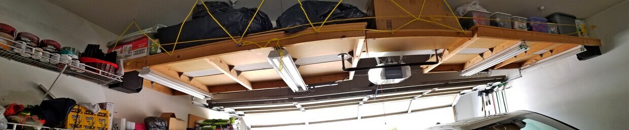 Garage ceil mounted storage shelf - 78 Santa Barbara Ct