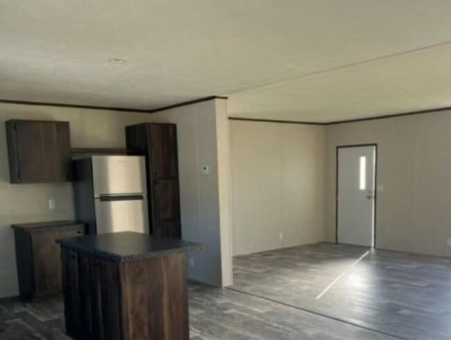 Building Photo - Golden Pebble Estates