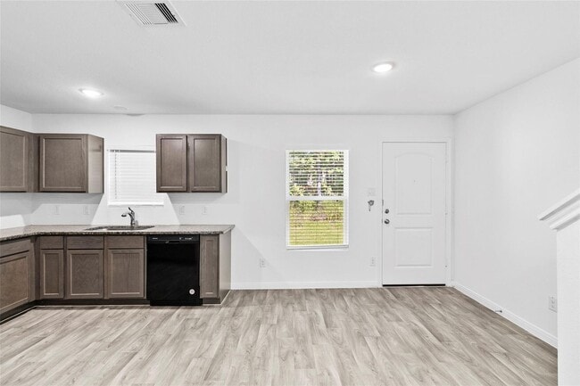 Building Photo - For lease in the sought-after Cedar Point community, this delightful home boasts 1,065 square fee...