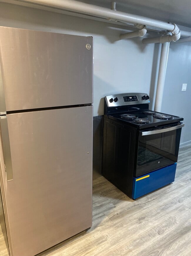 Photo - 4865 W Concord Pl Apartments