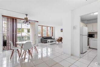 Building Photo - 9440 W Bay Harbor Dr
