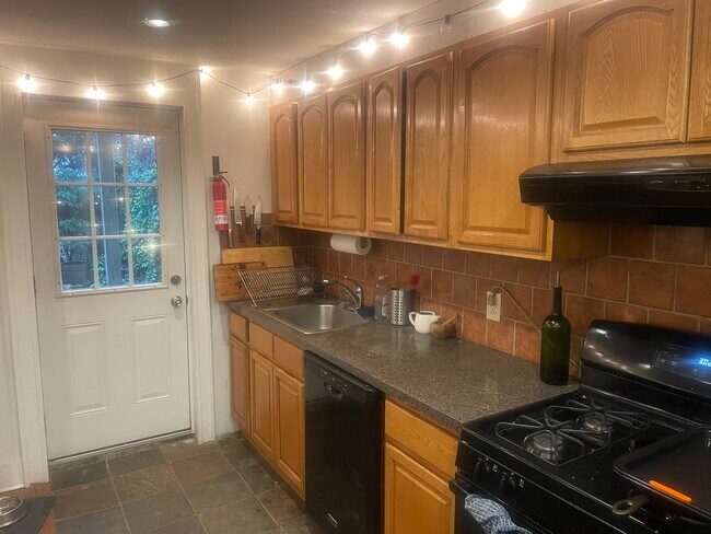 Kitchen area leads out to garden. - 391 8th St